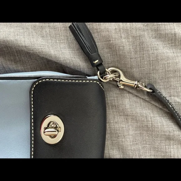 Small Coach cell phone bag with toggle clasp - gently used - Picture 7 of 8